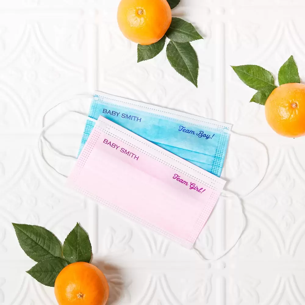 Create a gender guessing game at your fall baby shower with pink and blue face masks