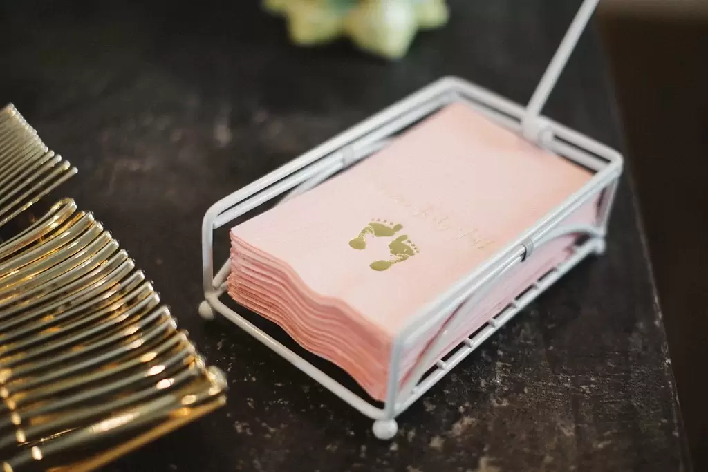 Baby Pink Guest Hand Towels with shiny gold foil stamped baby shower design