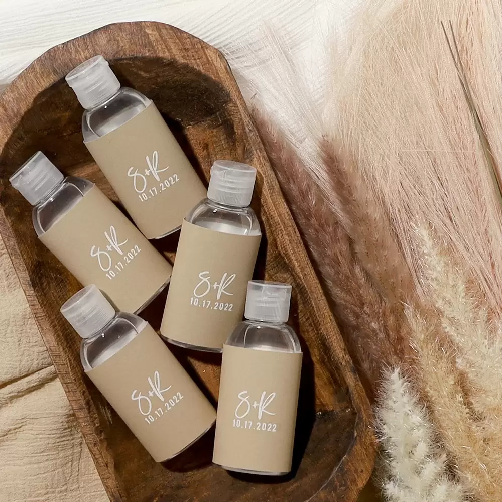offer your wedding guests custom hand sanitizer bottles at your wedding