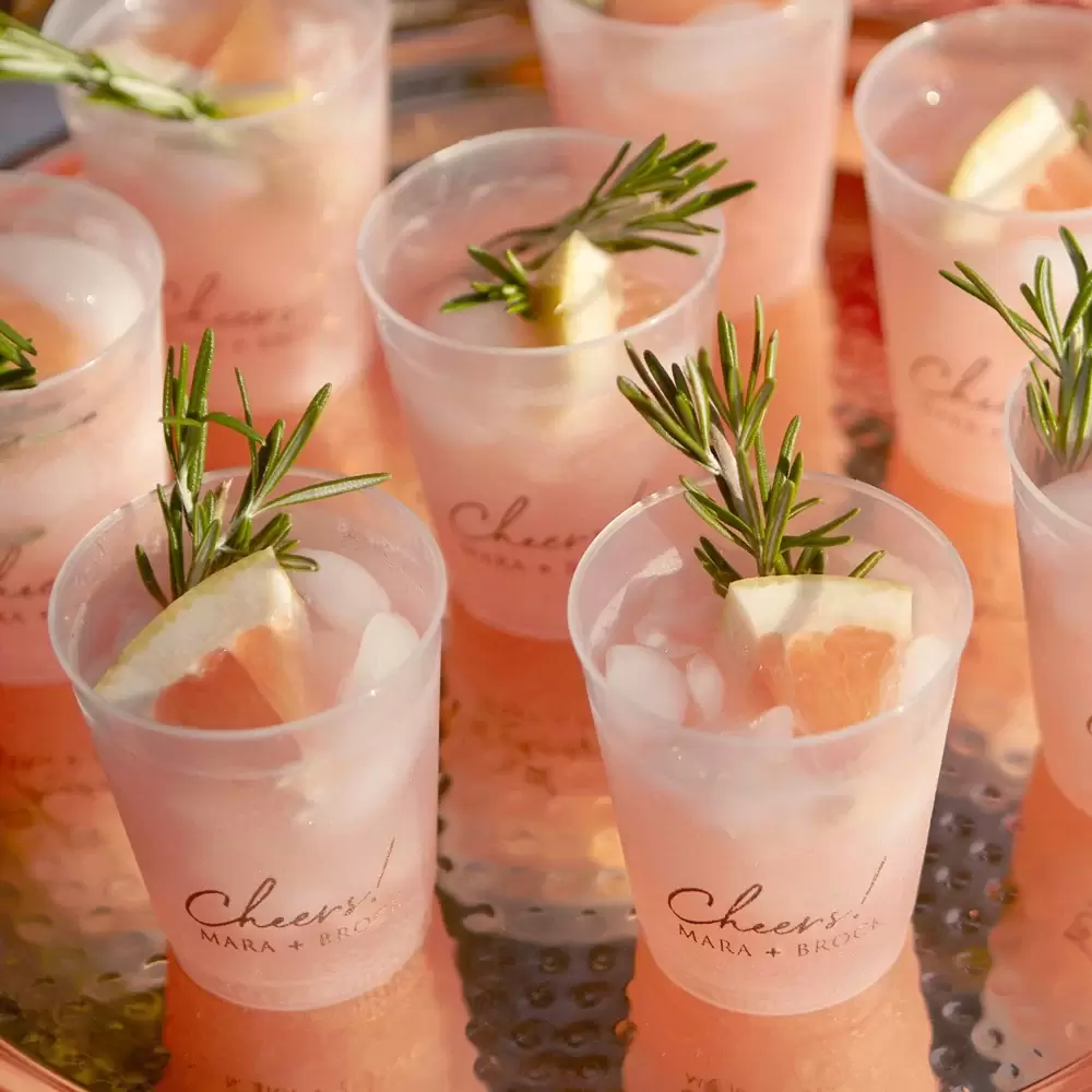 pass signature cocktails in personalized wedding cups at your upcoming wedding