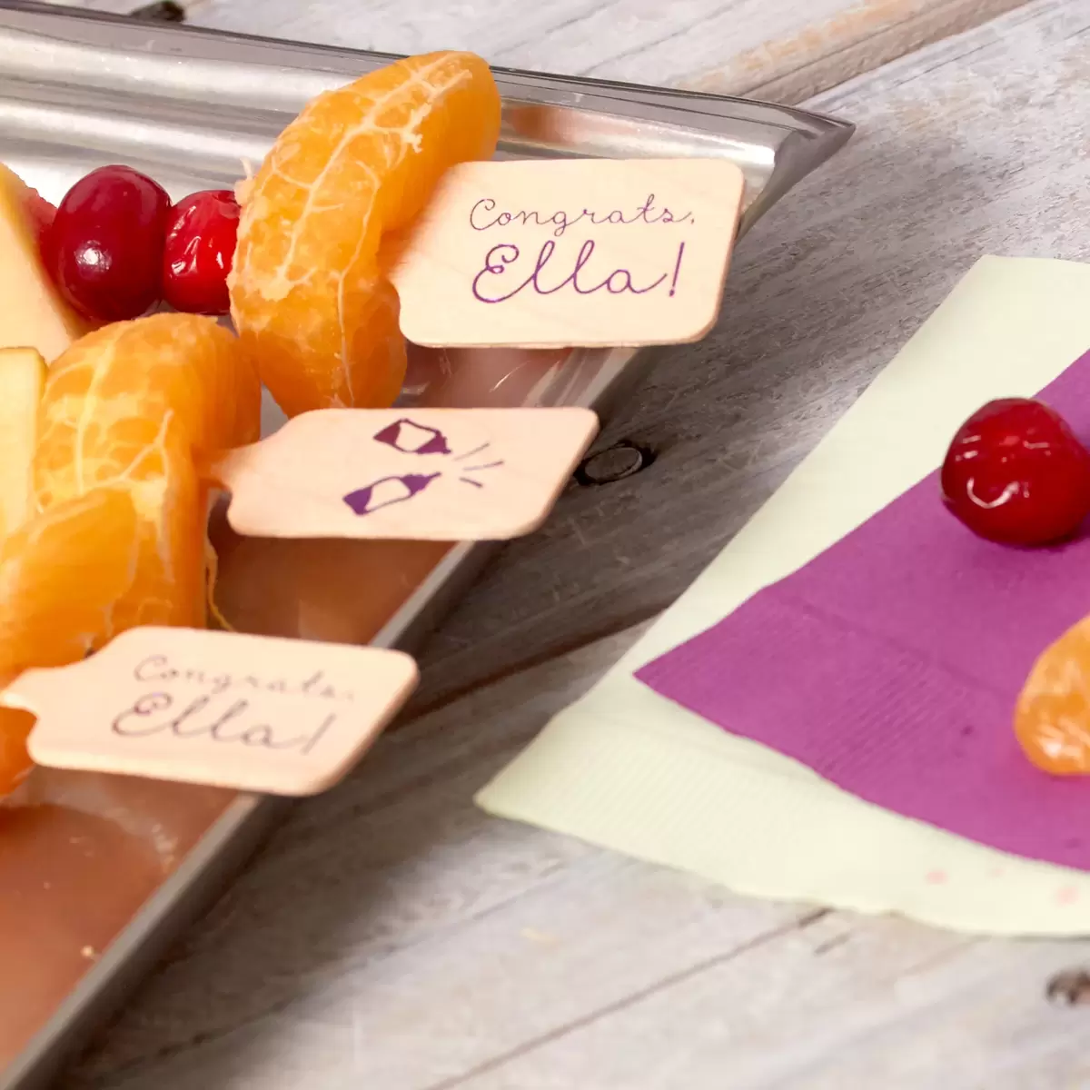 baby shower fruit kebobs with custom stir sticks