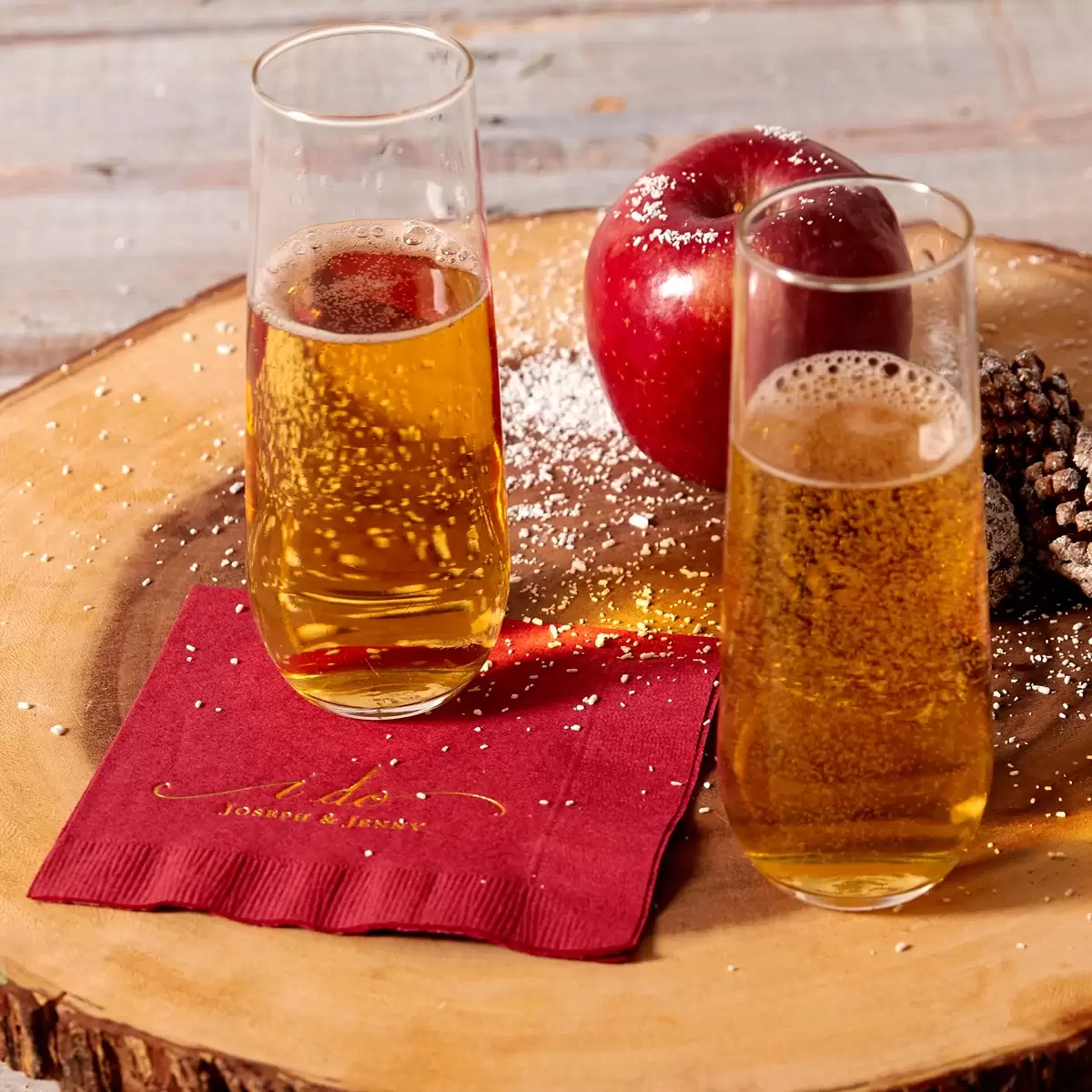 champagne apple cider with personalized cocktail napkin