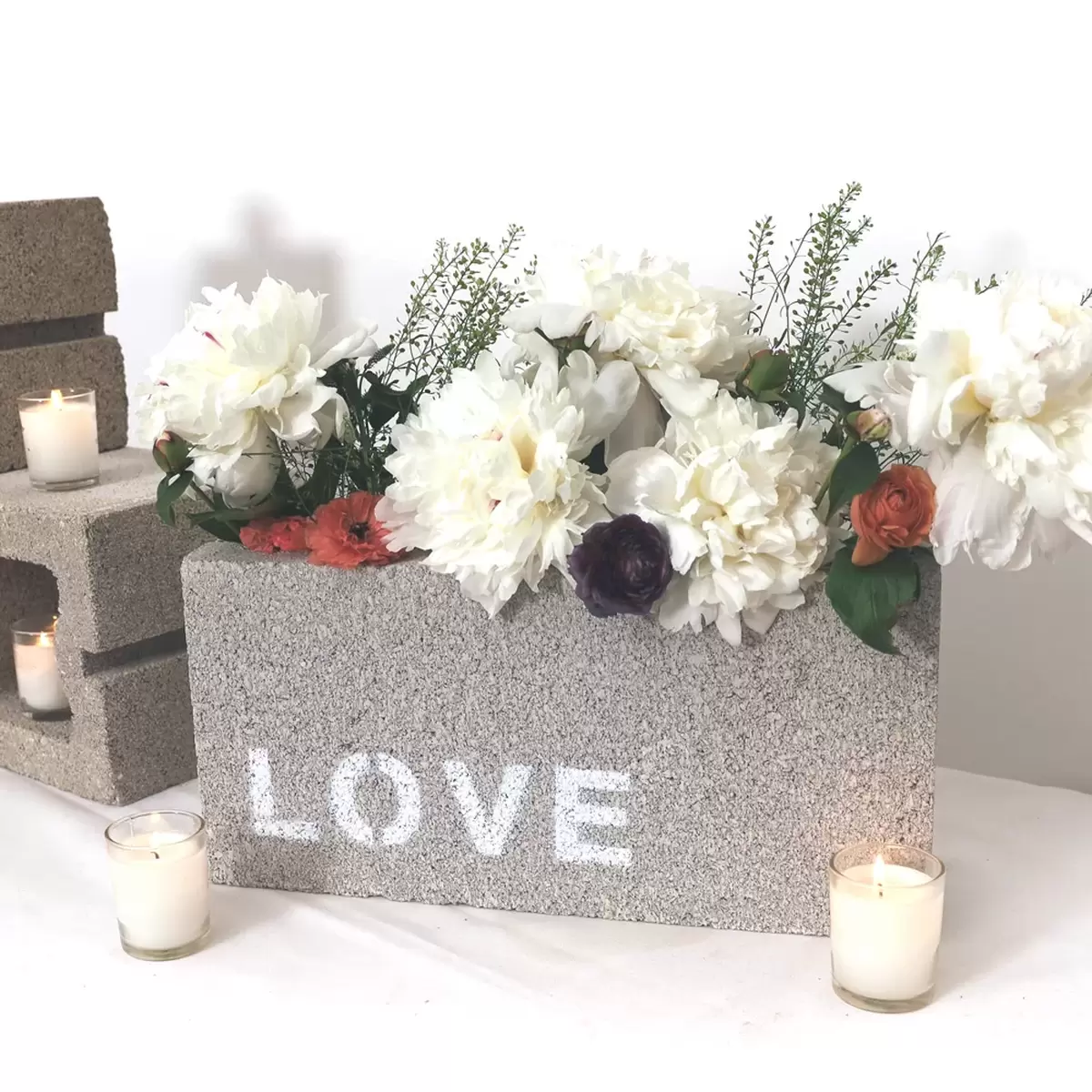 simple flower bouquets tucked in urban wedding décor