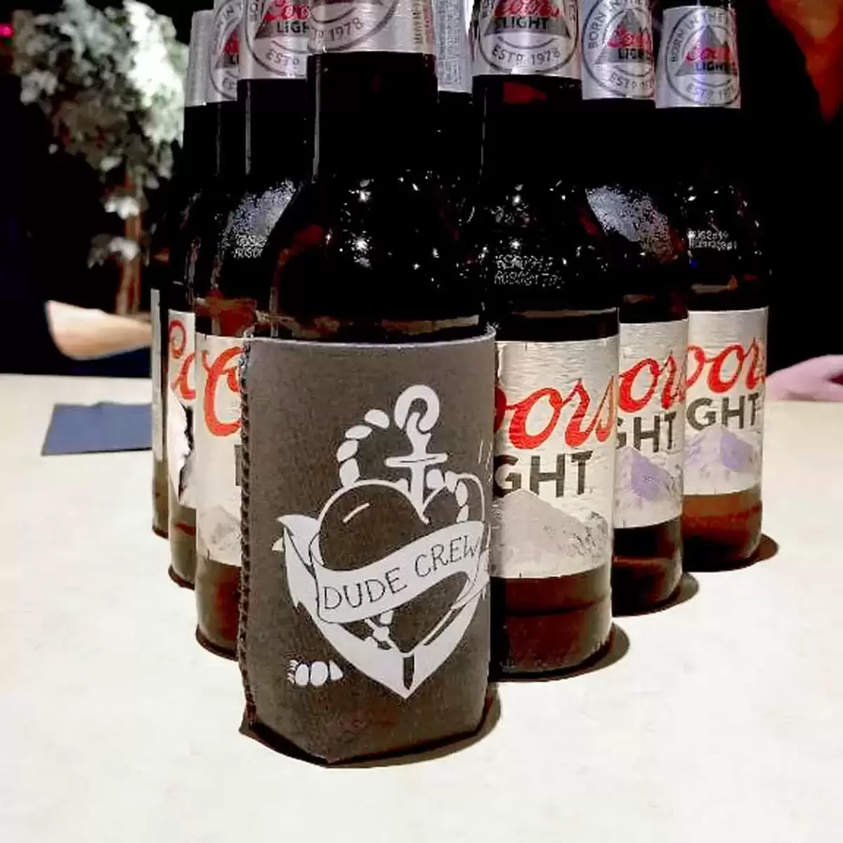 sailing bachelor party with custom "dude crew" koozies