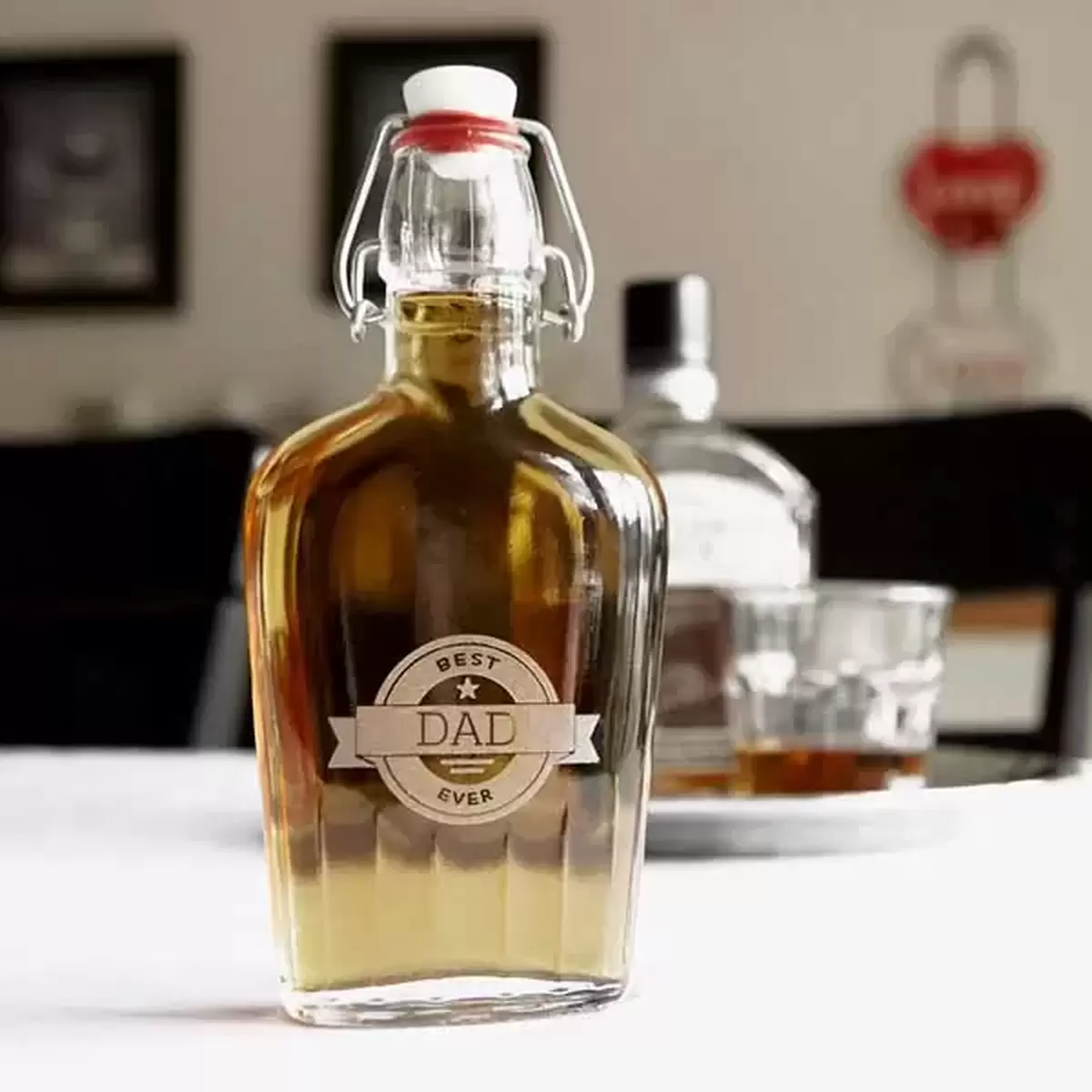 hand reaching for one glass of beer out of four arranged on a flight